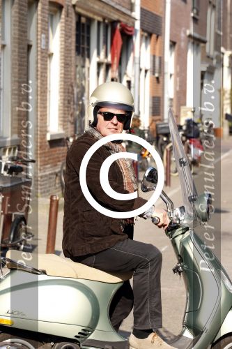 Amsterdam 29 maart 2011
Huub Stapel op zijn vespa scooter.
Peter Smulders bv