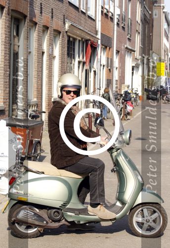 Amsterdam 29 maart 2011
Huub Stapel op zijn vespa scooter.
Peter Smulders bv