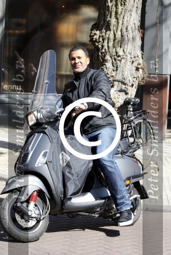 Amsterdam 11 april 2012
Ruud Gullit op zijn vespa scooter op de cornelis schuytstraat.
Peter Smulders bv