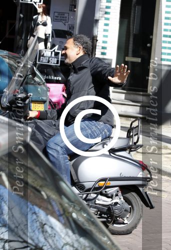 Amsterdam 11 april 2012
Ruud Gullit op zijn vespa scooter op de cornelis schuytstraat.
Peter Smulders bv
