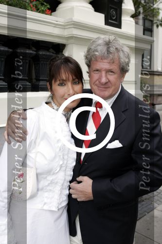 Amsterdam 11 juli 2004
Modeshow Wolford in het Amstel Hotel.  
Willibrord Frequin met vriendin Suzanne