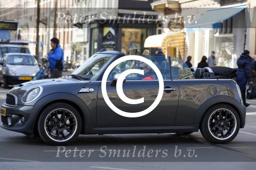 Amsterdam 11 maart 2015    
Caroline Tensen in haar mini cooper cabrio.
