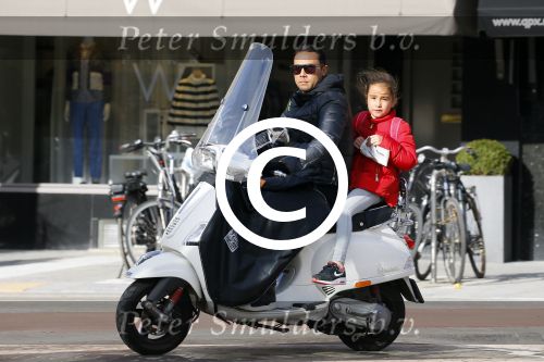 Amsterdam 10 maart 2015  
Danny Landzaat met dochter op vespa scooter
