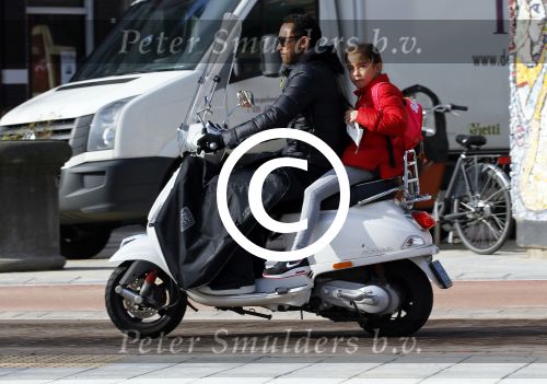 Amsterdam 10 maart 2015  
Danny Landzaat met dochter op vespa scooter