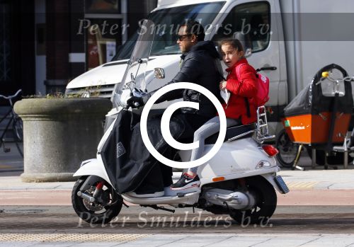 Amsterdam 10 maart 2015  
Danny Landzaat met dochter op vespa scooter