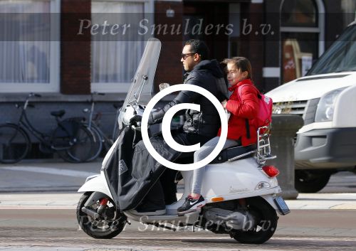 Amsterdam 10 maart 2015  
Danny Landzaat met dochter op vespa scooter