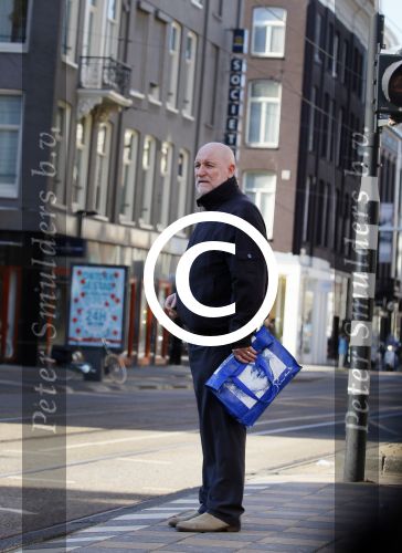 Amsterdam 11 maart 2015         
Hugo Metsers stapt in de tram