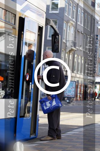 Amsterdam 11 maart 2015         
Hugo Metsers stapt in de tram