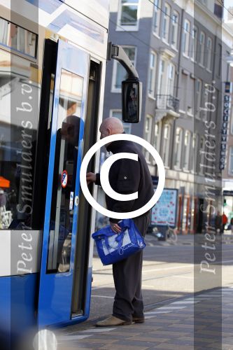 Amsterdam 11 maart 2015         
Hugo Metsers stapt in de tram