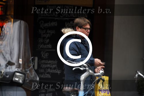 Amsterdam 9 maart 2015 
Martijn Krabbe doet boodschappen op zijn vespa scooter.