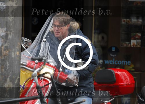 Amsterdam 9 maart 2015 
Martijn Krabbe doet boodschappen op zijn vespa scooter.