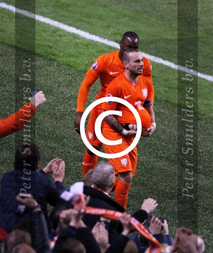 Amsterdam 28 maart 2015
Wesley Sneijder maakt de 1-1 bin Nederland-Turkije in de amsterdam Arena.
Daarna stopt hij een bal onder zijn shirt en een duim in zijn mond ten teken dat zijn vrouw Yolanthe Sneijder Cabau een kindje krijgen