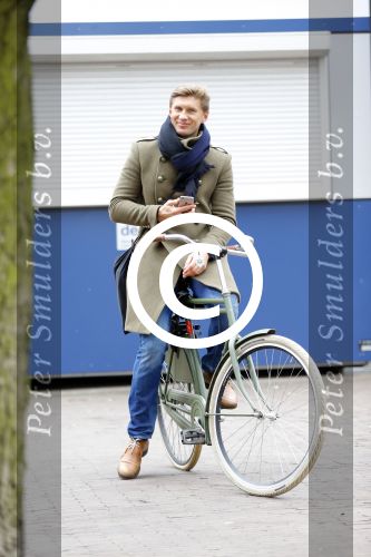 Amsterdam 20 maart 2016 
Evgeniy Levchenko bellend op zijn fiets in amsterdam zuid.