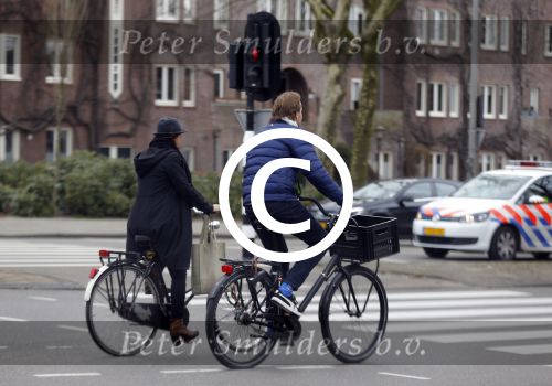 Amsterdam 23 maart 2016 
Gijs Staverman met (een) vriendin op de fiets in Amsterdam.