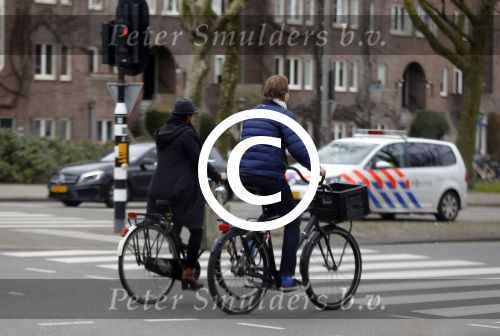 Amsterdam 23 maart 2016 
Gijs Staverman met (een) vriendin op de fiets in Amsterdam.