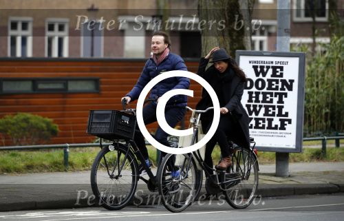 Amsterdam 23 maart 2016 
Gijs Staverman met (een) vriendin op de fiets in Amsterdam.