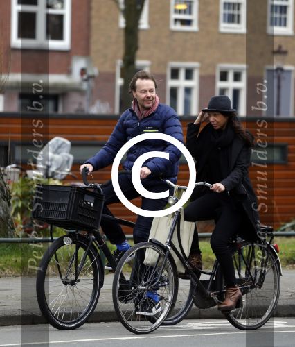 Amsterdam 23 maart 2016 
Gijs Staverman met (een) vriendin op de fiets in Amsterdam.