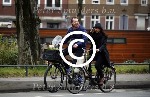 Amsterdam 23 maart 2016 
Gijs Staverman met (een) vriendin op de fiets in Amsterdam.