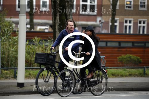 Amsterdam 23 maart 2016 
Gijs Staverman met (een) vriendin op de fiets in Amsterdam.