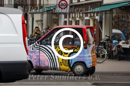 Amsterdam 18 maart 2016 
Vriendin Manuel Broekman in zijn scootmobiel