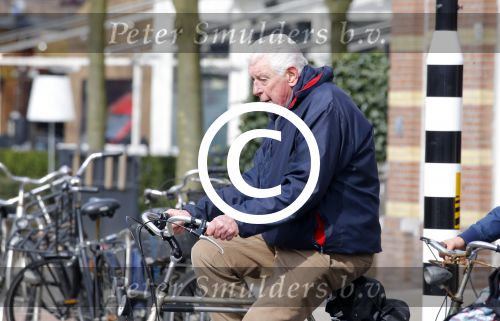 Amsterdam 31 maart 2016 
Wim Kok op de fiets in Amsterdam.