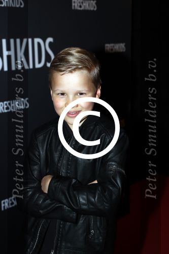 Amsterdam 26 maart 2017
Modeshow freshkids in the harbour club . kinderen en vrouwen van diverse voetballers liepen mee. Jerome Talsma gtst met moeder