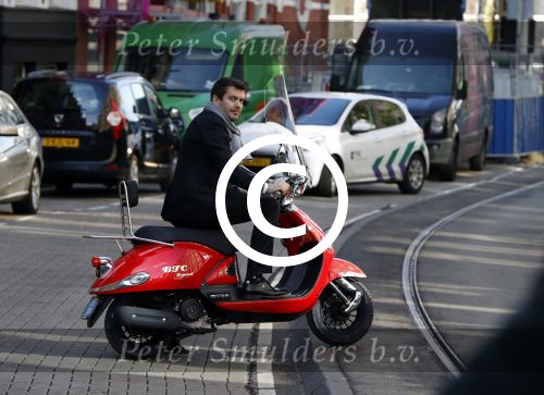 Amsterdam 9 maart 2017 
Ruben Nicolai op zijn scooter