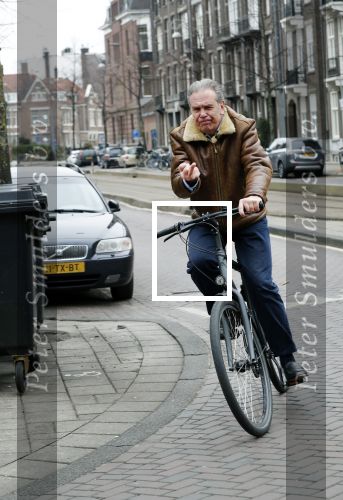 Amsterdam 15 maart 2018 
Maarten Spanjer op de fiets met middel vinger