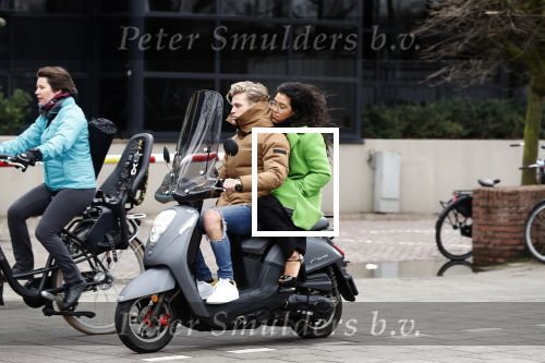 Amsterdam, 16 Maart 2019
Moise Trustfull met vriend op de scooter