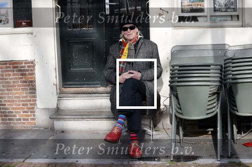 Amsterdam 26 maart 2021
Peter Faber op zijn vaste stek tijdens Corona bij cafe Kobalt