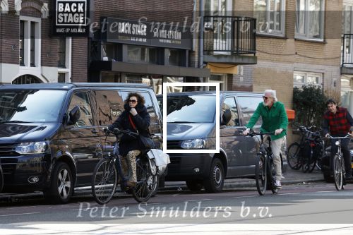 Amsterdam 8 april 2023
Henriette Tol met man op de fiets in het centrum van Amsterdam