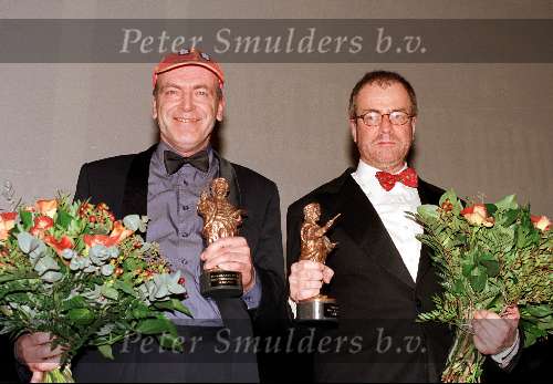 07 April 1999  Grolsch Master premiere
Links Berney Bos en Ben Sombogaart krijgen een \