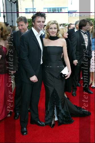 Scheveningen 4 april 2004
Premiere Lion King in Kurhaus.
Brigitte Neyman met vriend