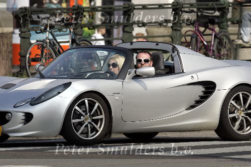 Amsterdam  24 april 2005
Fiona Heering met Jeroen (vespa) in Lotus cabrio.