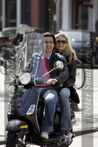 Amsterdam 23 april 2005
Nicolette v Dam met vriend op vespa scooter