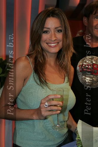Amsterdam 25 april 2005
1000e aflevering van shownieuws. 
Rebecca Loos met champagne en grote ring