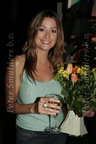 Amsterdam 25 april 2005
1000e aflevering van shownieuws. 
Rebecca Loos met champagne en grote ring