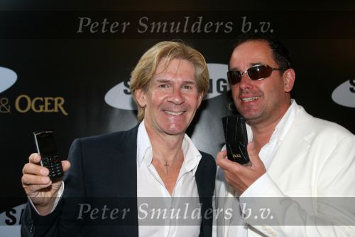 Amsterdam, 12 Juli 2006
Presentatie nieuw GSM Toestel type van Samsung X820 i.s.m. met Oger.  Addy v d Krommenacker met zijn vriend
