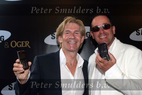 Amsterdam, 12 Juli 2006
Presentatie nieuw GSM Toestel type van Samsung X820 i.s.m. met Oger.  Addy v d Krommenacker met zijn vriend
