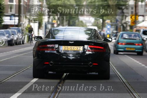 Amsterdam 22 juni 2006
Bram Moszkowicz in zijn nieuwe aston martin db9
Peter Smulders b