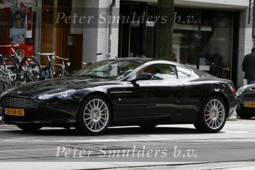 Amsterdam 22 juni 2006
Bram Moszkowicz in zijn nieuwe aston martin db9
Peter Smulders bv