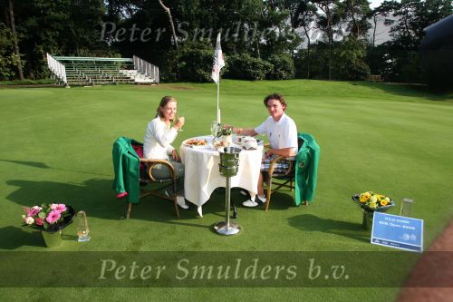 Molenschot, 22 Juli 2006
Golfclub Toxandria, Internationaal Golftoernooi Riverwoods 
Tim Sluiter en Christel Boeljon samen op de green van 18 voor de traditionele lunch voor de winnaars