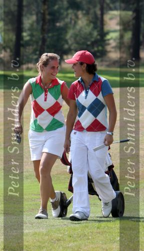 Molenschot, 22 Juli 2006
Golfclub Toxandria, Internationaal Golftoernooi Riverwoods 
Dewi Claire Schreefel met haar caddy