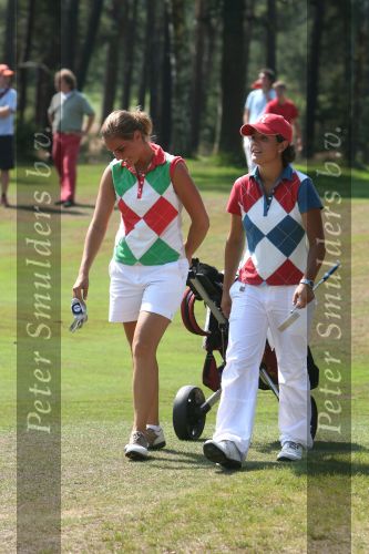 Molenschot, 22 Juli 2006
Golfclub Toxandria, Internationaal Golftoernooi Riverwoods 
Dewi Claire Schreefel met haar caddy