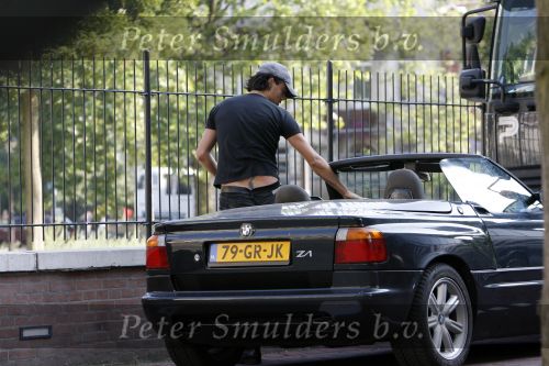 Amsterdam 23 juli 2006
Dinand Woesthof in bmw cabrio met tatoo