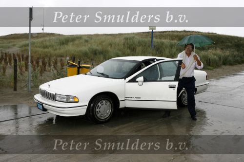 Monster 21 augustus 2006
Bijeenkomst van het wereld natuurfonds.
Emile Ratelband in de regen met zijn taxi
Peter Smulders bv