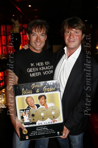 Blaricum 17 mei 2006
Gerard Joling  Gordon en Peter Gallas met gouden dvd