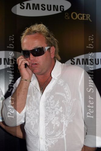 Amsterdam, 12 Juli 2006
Presentatie nieuw GSM Toestel type van Samsung X820 i.s.m. met Oger.  Gordon met een nieuw kapsel