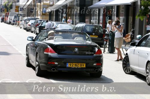 Amsterdam 30 juni 2006
Gordon in BMW cabrio op de pc hooftstraat met zijn broer
Peter Smulders bv