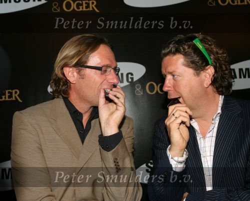 Amsterdam, 12 Juli 2006
Presentatie nieuw GSM Toestel type van Samsung X820 i.s.m. met Oger.  Henkjan Smits samen met Eric v Tijn